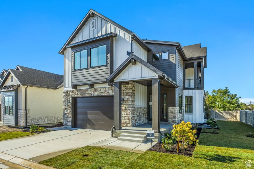 Welcome to Concord Lane in Draper.A stunning BRAND NEW home designed for modern living. This 4 bedroom, 4 bathroom masterpiece offers 4500 sq of thoughtfully crafted space, blending style, comfort, and efficiency. Step into an open-concept floor plan featuring high ceilings, abundant natural light, and premium finishes. The gourmet kitchen is a chef's dream, boasting custom cabinetry, quartz countertops, a large island, wall ovens, and a large pantry. The primary suite is a true retreat with a spa-inspired ensuite bathroom, double vanity, and a spacious walk-in closet. Built with quality and energy efficiency in mind, this home includes a balcony facing Wasatch Mountains engineered to hold a hot tub. The beautifully landscaped yard and covered patio offer the perfect setting for relaxation or entertaining. There are only a few homes available in this new community that are each curated with beautiful finishes. This exceptional home is ready to  move in NOW!!!. Do not miss the opportunity to make it yours!