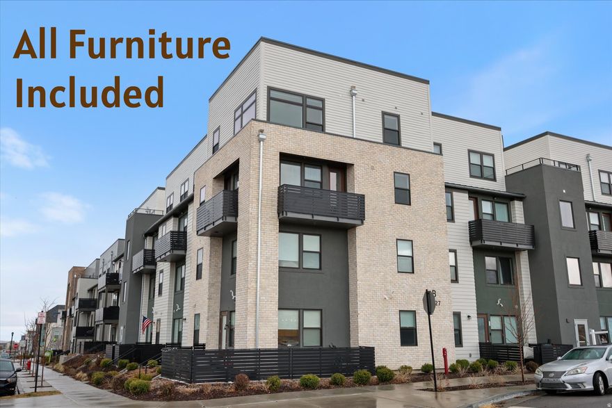 Why wait for new construction? This barely lived-in, move-in ready Daybreak condo is available now and ready to enjoy! Beautiful 2-story condo located within walking distance of the new Bees Stadium and the vibrant Downtown Daybreak district.  This fully furnished home features stunning quartz kitchen countertops, an open-concept floor plan, and abundant natural light throughout. Large windows-including oversized windows in the primary bedroom-fill the home with light year-round, creating a bright and inviting space.  Enjoy the outdoors from two private balconies, perfect for relaxing and taking in the energy and lifestyle of the Daybreak master-planned community. Even during colder months, the home's large windows keep the space bright and welcoming.  Located in the heart of Daybreak in South Jordan, you'll enjoy a walkable location close to parks, scenic walking and biking trails, Oquirrh Lake, SoDa Row shopping and dining, TRAX light rail, and the new Bees Stadium entertainment district.  Furniture available with the home-making this a rare turnkey, move-in ready opportunity in one of Utah's most desirable communities.  Experience low-maintenance living with incredible amenities and a vibrant neighborhood lifestyle that makes Daybreak one of the most sought-after communities in the Salt Lake Valley.