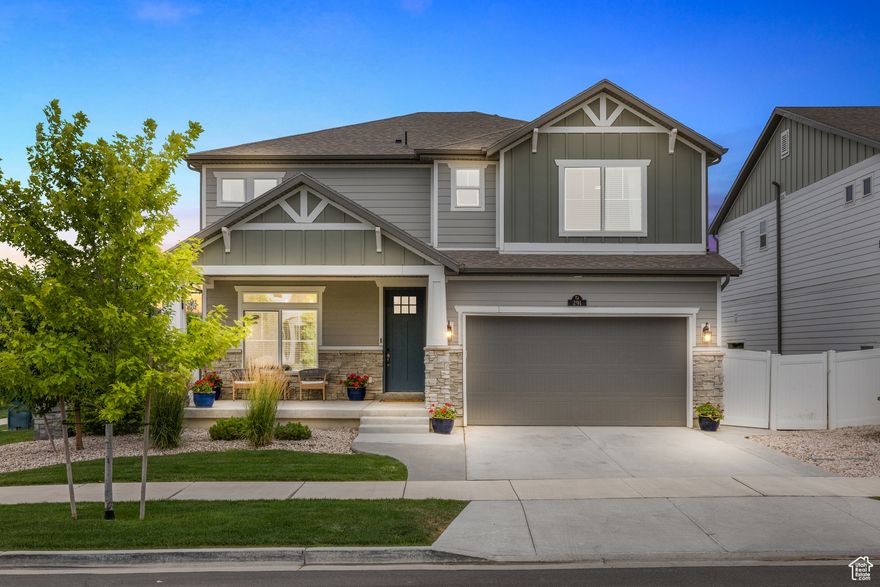 Welcome to the Wander community - one of Saratoga Springs' most sought-after neighborhoods, offering newer homes, a community pool with a waterslide and mountain views, and close access to city amenities. Just outside your door, you can stroll along a picturesque creek that runs beside the neighborhood (perfect for peaceful walks or even fishing) and follow the path right over to Patriot Park, one of the area's best parks with pickleball courts, ball fields, bike trails, and a top-rated playground.  Inside, this home is full of thoughtful upgrades. Just off the entry is a bright, modern office enclosed by black-metal and glass barn doors, complete with built-in cabinetry and a custom desk. The main level features a designated formal dining area and a spacious living room with a beautiful fireplace, all connected to the open kitchen with upgraded finishes.  Upstairs, the primary suite offers a serene retreat with hand-applied Venetian plaster and a large walk-in closet. A stylish loft with wood-slat detailing adds charm and flexibility, while the finished basement expands your living space for guests, play, or movie nights. Out back, a fully fenced yard gives you space to relax and entertain.  If you're looking for a home with character, space, and access to everything that makes Saratoga Springs special, this is the one!