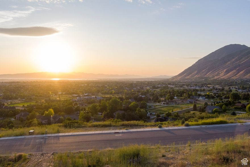 This lot offers the best of both worlds: unobstructed valley views from the front and an extremely private, tree-lined backyard with mountain views in the back. Buy the lot for $670,000 and bring your own builder, or have Lewis Contracting build the stunning 7,816 sq ft custom home already designed for $1,503,040. Lot+ Home = Total cost of $2,173,040. See alternate plan for the total cost of $1,797,980. Home is also listed to-be-built as MLS: 5075315.  Whether you want to build your dream home from scratch or bring this luxury design to life, this rare setting delivers privacy, scenery, and flexibility.  All information provided is deemed reliable but not guaranteed. Buyer to verify all details.
