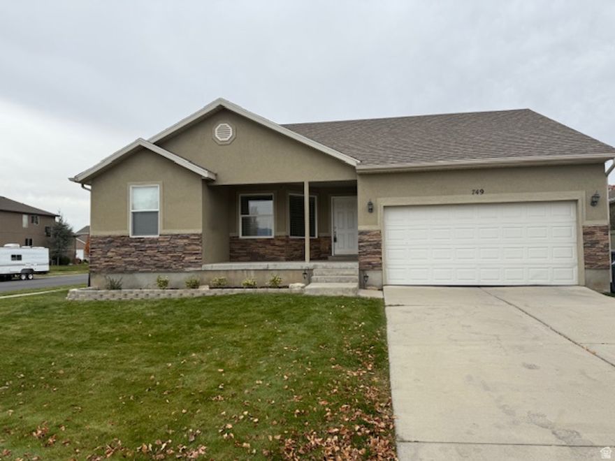 Charming Rambler in Saratoga Springs across the street from the neighborhood park, close to shopping and schools. On a corner lot with a great view of the mountains.  The basement is a blank canvas for you to finish it how you would like it.  New AC and Furnace replaced a few months ago.  Don't miss seeing this home.   Square footage figures are provided as a courtesy estimate only and were obtained from county records.  Buyer is advised to obtain an independent measurement.