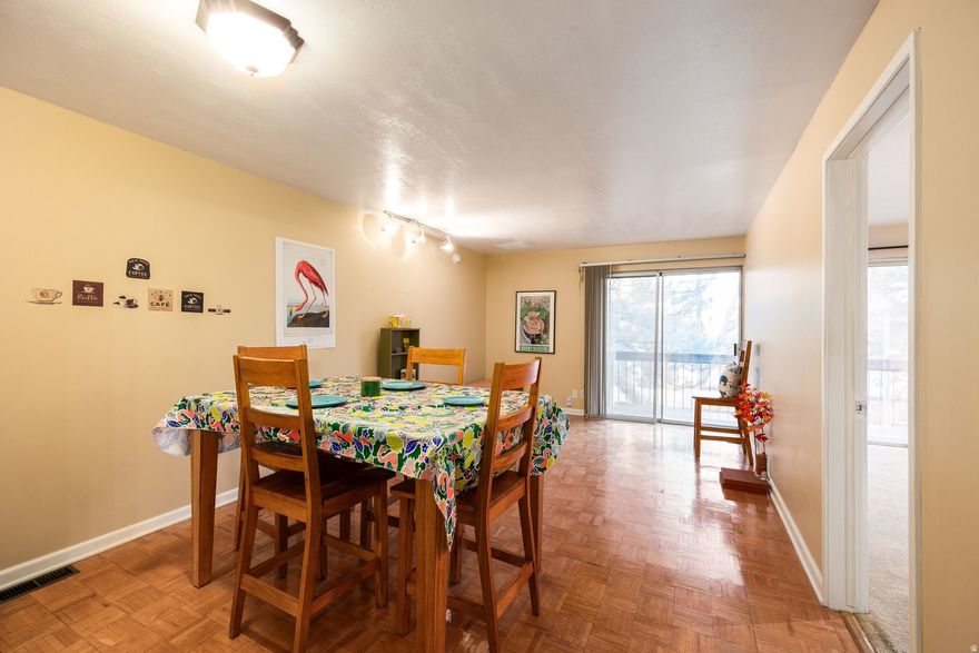 Enjoy city living at its best in this well-maintained top-floor unit in the heart of Salt Lake City. Just minutes from downtown shopping, the University of Utah, hospitals, restaurants, and TRAX, you'll enjoy the convenience and energy of city life with modern comfort at home.  Inside, granite countertops, stainless steel appliances (including a gas stove), and hardwood floors create a sleek, move-in-ready space. The open living room welcomes natural light and flows seamlessly to a private balcony through a sliding glass door-perfect for relaxing or sipping morning coffee. This upper-level unit offers spacious and airy living, making it ideal for both owners and investors.