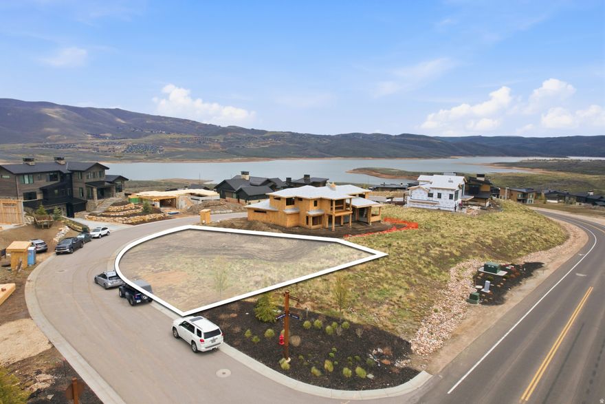 This stunning ready to build homesite in SkyRidge has stamped homeplans available and offers breathtaking panoramic views of the ski runs at Deer Valley Resort and the tranquil waters of the Jordanelle. As part of the exclusive SkyRidge community, you'll have access to amenities that cater to your every need and desire. Offering a private shuttle service from home to slopes, golf and a state-of-the-art clubhouse to a full-service pro shop and a gourmet market cafe & iconic bar, every detail has been thoughtfully curated. The private clubhouse with pool, hot tub, and exercise studio overlooks the ParOne golf, Deer Valley and lake. And for those who seek a balanced lifestyle that seamlessly blends adventure with relaxation, SkyRidge Mountain Community offers the perfect home base for endless Park City exploring. Whether you're hitting the slopes at Deer Valley Resort, dining at world-class restaurants, or indulging in the vibrant cultural scene, this community provides the ideal backdrop for a life well-lived.