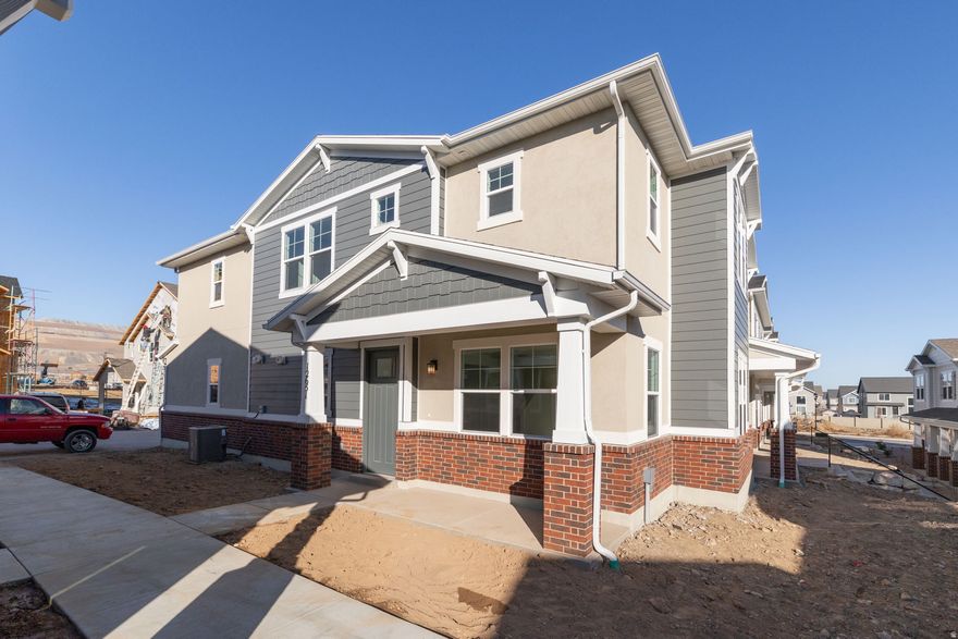 Nestled in the vibrant community of Herriman, Utah, this two-story townhome offers 4 bedrooms, 2.5 bathrooms, and a stylish, comfortable layout perfect for modern living. The main level features an open-concept design, where the living room flows effortlessly into the dining area and kitchen. The thoughtful layout makes the space ideal for both entertaining and everyday living. Upstairs, you'll find four bedrooms and a laundry room conveniently located on the second floor adds to the home's practicality. This townhome features a two-car attached garage and is situated in a vibrant neighborhood near excellent schools, shopping, dining, and outdoor recreation. Offering a blend of modern living and everyday convenience, this Herriman home is ready to welcome you. Schedule a tour today to see it for yourself! Square footage figures are provided as a courtesy estimate only and were obtained from building plans.