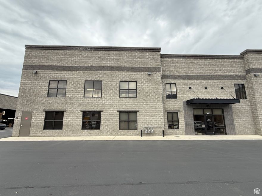 Lightly used  office/warehouse space in great location.  Close access to I-15.  2 levels of office space with break area kitchen and bath/shower.  5 offices with space for cubicles.  Warehouse is 4300 sq feet with an additional 1000 sq feet of mezzanine for additional storage.  Ground level overhead door.  Owner has outgrown the space.