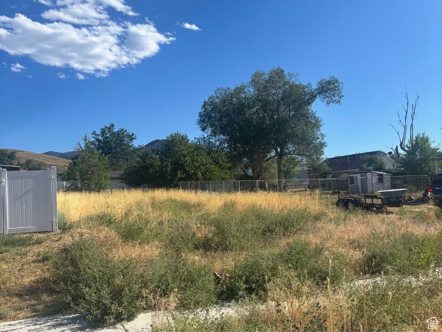 This 0.11-acre residential lot is perfect for a starter home or investment property. Located in central Tooele, it has convenient access to local schools and amenities. Zoned R1-7 for single-family use, with no HOA. Don't miss this opportunity to build in a well-established neighborhood!