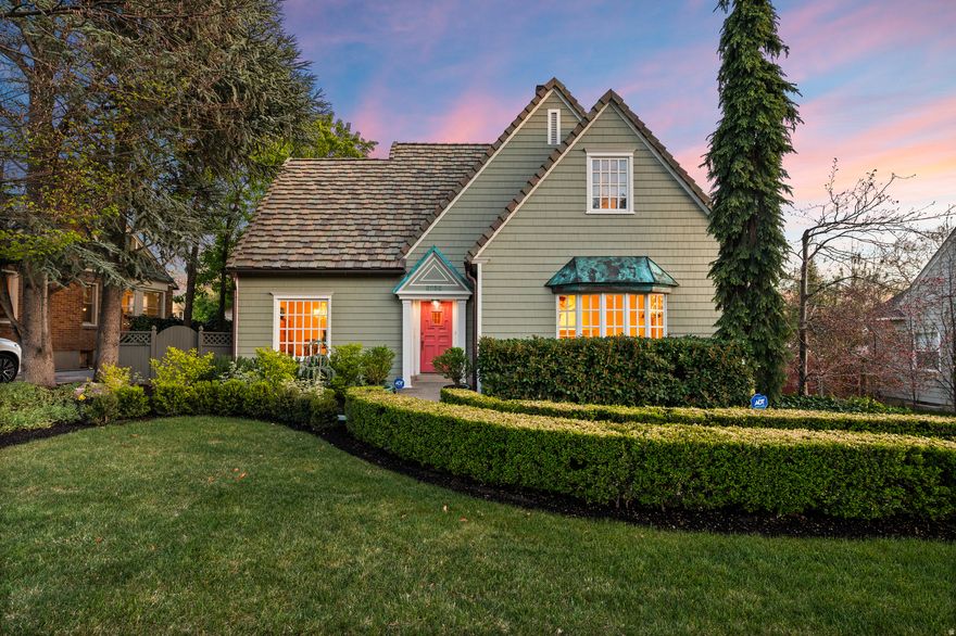 Beautifully updated home filled with natural light and inviting living spaces. High cathedral ceilings create an open, airy feel, while the spacious kitchen overlooks a serene, zen-like garden.  Elegant finishes throughout include extensive millwork, a marble fireplace with gas log, and a striking black-and-white marble foyer. Features a dedicated office, abundant storage, and a well-designed mudroom with custom cabinetry and built-ins.  Expansive laundry room offers tile flooring, sink, built-in ironing board, sewing station, and cedar closet. Spa-inspired bath with jetted tub and heated floors.  Recent upgrades include a new tile roof, copper awnings, gutters, chimney cap, exterior lighting, Hardie board siding, fresh paint, updated electrical, and dual water meters.  Ideally located in the sought-after Yalecrest neighborhood on a .22-acre lot, near the University of Utah, hospitals, excellent schools, parks, and close to trails, Emigration Canyon, and Parleys Canyon.  Enjoy a private, storybook yard that provides a peaceful outdoor retreat. A rare blend of comfort, style, and functionality.  Square footage figures are provided as a courtesy estimate only.  Buyer is advised to obtain an independent measurement.