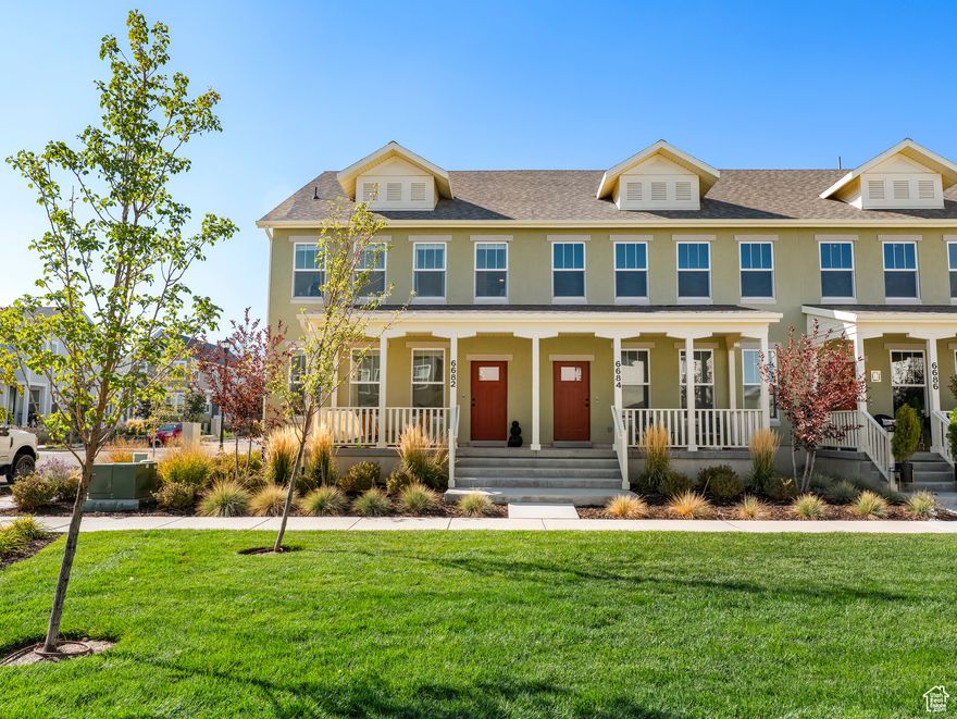 Welcome to your light and bright end-unit townhome in the heart of Daybreak's Upper Villages! Built in 2023, this modern 3-bed, 2-bath home offers a sunny, open layout, two-car garage, and a lush community green space just steps from your front porch. What truly sets this home apart is the neighborhood itself-a close-knit community where neighbors look out for one another and friendships come easy. Just a short stroll to The Cove House, Daybreak's newest hangout near the Watercourse-perfect for coffee/soda runs, evening walks, and weekend fun!