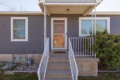 Tiny photo for 7387 S HALELANI DR. Dr E, Midvale, UT 84047 (MLS # 2154983)