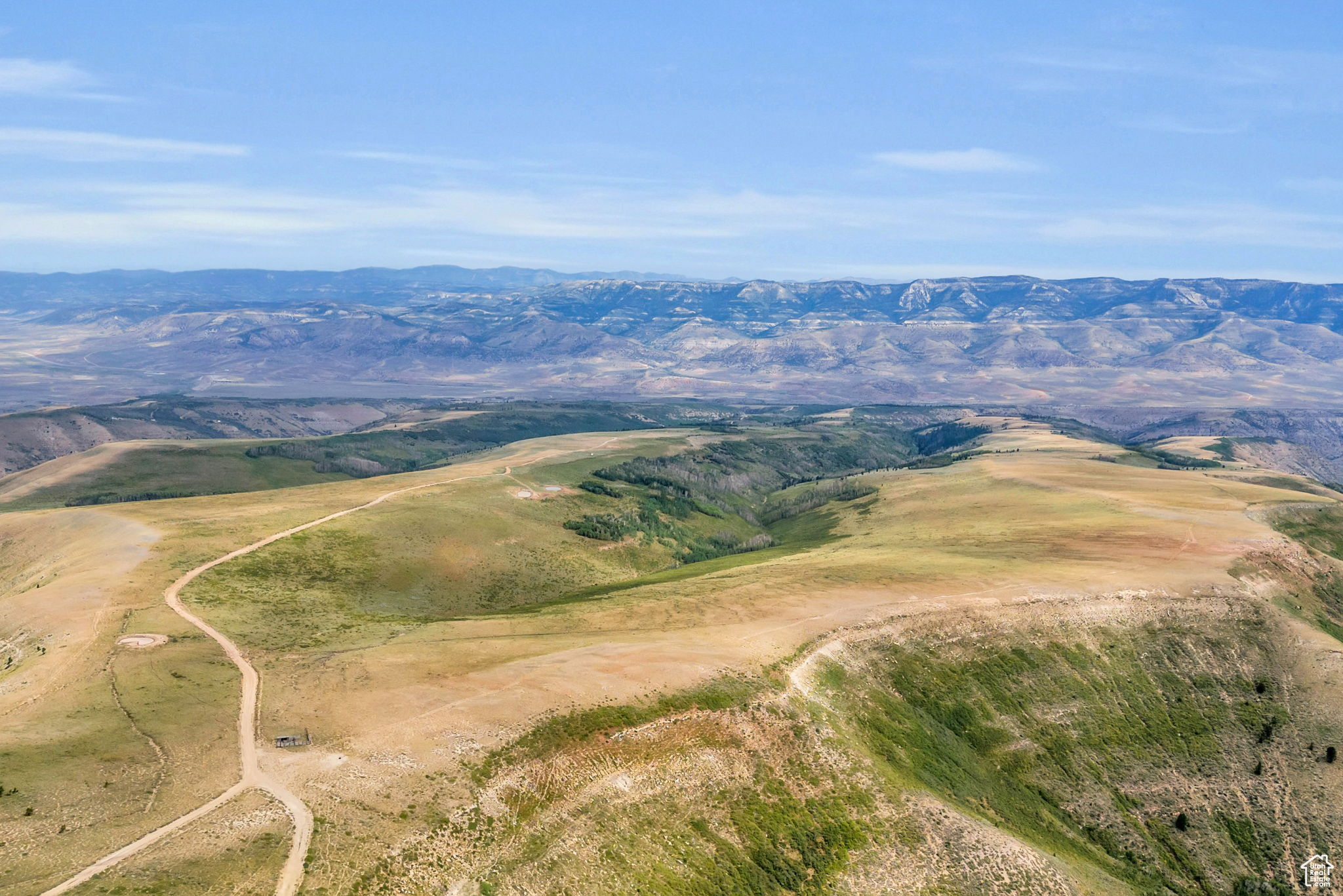 Discover a rare opportunity to own 1,616 acres of untouched wilderness in Helper, Utah. This property seamlessly blends natural beauty with exceptional potential on a family ranch dating back over a century. Encompassing multiple parcels, this is an outdoor enthusiast's dream, offering not only the perfect setting for hunting, but also the chance to explore endless terrain on your ATV, UTV, mountain bike, or simply hiking to soak in the raw beauty. With existing water rights and an electrical power line easement on the property, you have the potential for many of the utilities you'll need to build your ideal retreat. Additionally, the property is mostly surrounded by BLM land, significantly expanding the space available for exploration and ensuring that your enjoyment of this vast wilderness goes beyond the boundaries of your private acreage. Don't miss this unique opportunity to own a piece of Utah's rugged landscape and create your sanctuary in nature.