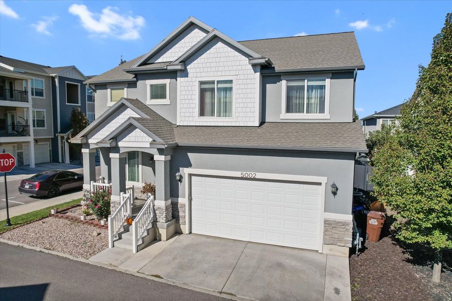 Preferred lender incentive of 1% being offered toward closing costs or rate buydown. Seller requires a 2-hour heads-up for showings as they currently occupy the home.  This stunning home, built in 2018 and fully remodeled, offers plenty of space and comfort with 6 bedrooms and a fully finished basement, perfect for any family. The home has been fully renovated and features hard flooring throughout. Several areas are styled with elegant imported rugs that add warmth and sophistication while preserving the clean, modern look of the space. Enjoy an oversized outdoor patio with a gazebo and built-in fireplace, ideal for summer BBQs or evening get-togethers. Inside, you'll love the vaulted ceilings, spacious kitchen designed for cooking or entertaining, and the fully fenced backyard that's perfect for kids or pets. Sitting on a desirable corner lot with a two-car garage, this home truly checks every box.  The water softener, furnace and roof are 7 years old, adding peace of mind for future maintenance.  Located just minutes from Mountain View Corridor and Mountain View Village Shopping Center, you'll have quick access to shops, restaurants, and entertainment. The neighborhood is also incredibly family-friendly, just a short walk to J. Lynn Crane Park with its splash pad, ice rink, and year-round community events. Square footage figures are provided as a courtesy. Buyer is advised to obtain an independent measurement. Buyer and broker to verify all information, including HOA details. See agent remarks for showing and offer instructions.