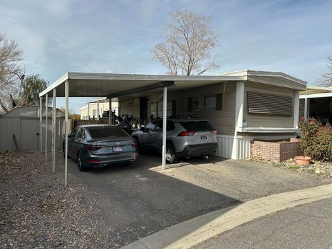 Photo of 621 EXCALIBUR St #143, North Salt Lake, UT 84054 (MLS # 2123965)