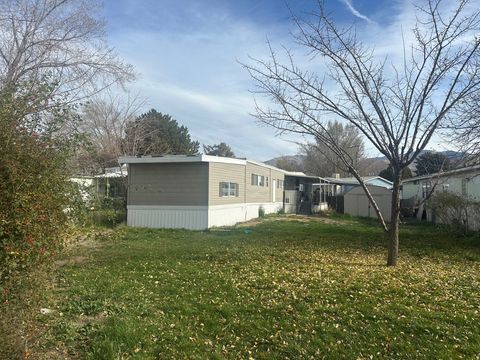 Tiny photo for 621 EXCALIBUR St #143, North Salt Lake, UT 84054 (MLS # 2123965)
