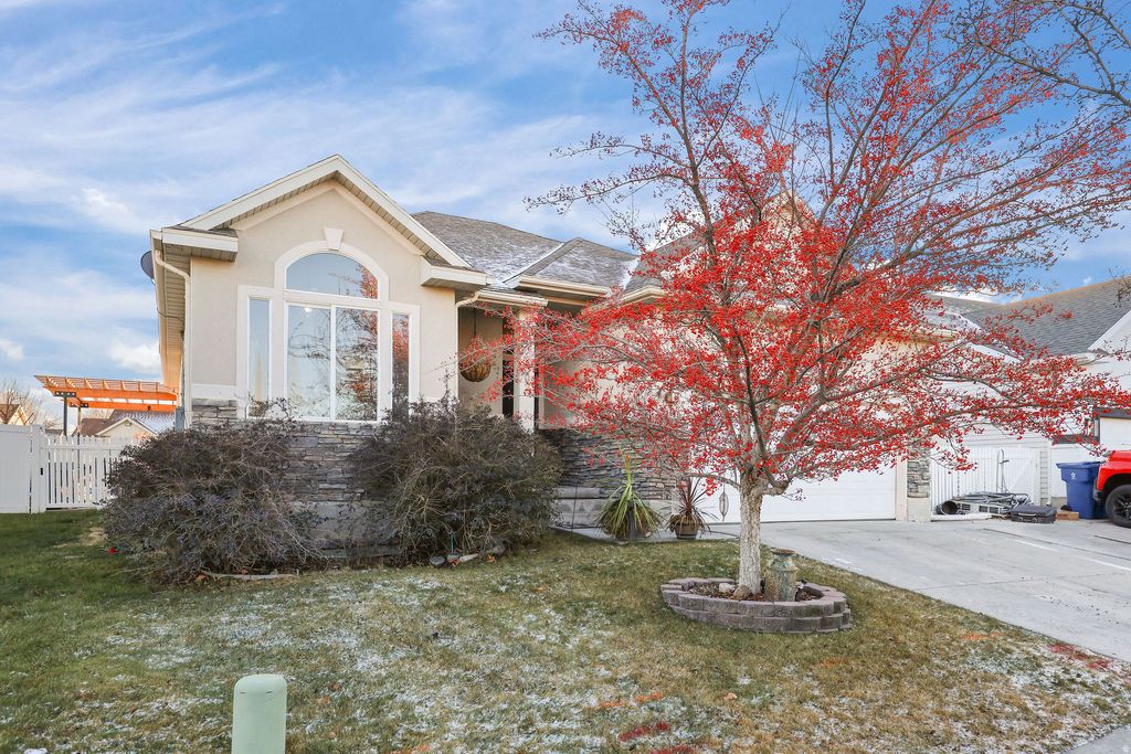 Photo of 302 E INTERLOCHEN LN N, Stansbury Park, UT 84074 (MLS # 2130613)