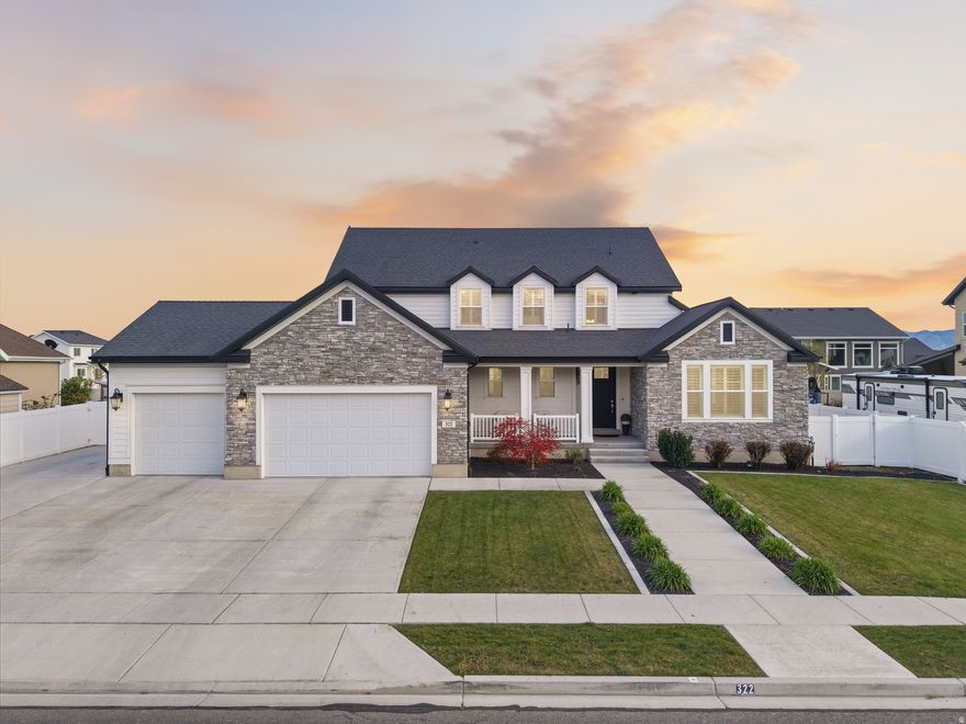 Walk into this stunning 2020 Ivory-built home in prestigious Vivian Estates - minutes from Traverse Mountain, Thanksgiving Point, and Skyridge High. Soaring 10' and 18' ceilings, oversized windows, and a north-facing orientation showcase breathtaking Utah sunsets. The chef's kitchen boasts maple cabinets, double ovens, 36" 5-burner cooktop, Bosch dishwasher, and a large island with a prep sink. LVP flooring throughout. Two air-conditioning units. Main-floor primary suite + laundry. Upstairs: 3 bedrooms, 2 baths. Finished walkout basement with game room, 3 bedrooms -  one being used as an office and one as a gym, extra large cold storage, and future kitchen rough-in. Oversized 3-car garage with RV pad. Storage everywhere. This one has it all!