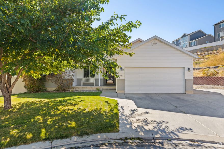 Spacious 6-bedroom, 3-bath home located in the desirable Harvest Hills community of Saratoga Springs! Conveniently situated just off Redwood Road with easy access to both Pioneer Crossing and 2100 N, this well-cared-for home offers a large open great room and numerous recent upgrades throughout. Enjoy peace of mind with new double-pane tilt windows, a new high-efficiency furnace and A/C, new water heater, new double oven, dishwasher, and sump pump. The backyard features a new vinyl privacy fence, new patio awning, expanded concrete parking, and a new in-ground trampoline - included! Lifetime swing set, refrigerator, and home theater projector are also included, making this home truly move-in ready. Don't miss this rare find in a family-friendly neighborhood close to schools, parks, and amenities. All information within is provided as a courtesy only.  Buyer and Buyer's agent advised to complete their own due diligence.   Square footage figures are provided as a courtesy estimate only and were obtained from tax records.  Buyer is advised to obtain an independent measurement.
