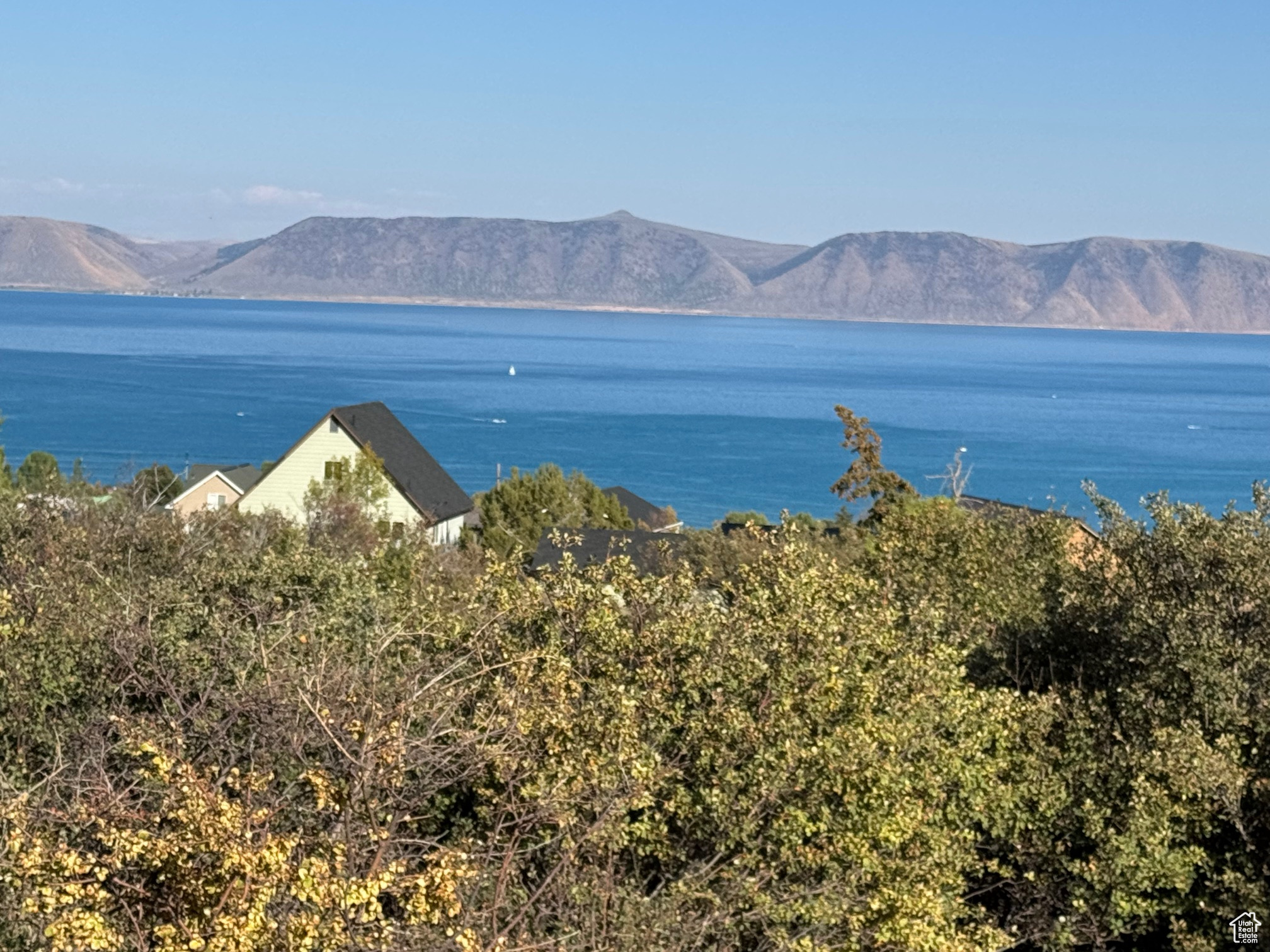 Gorgeous unobstructed Bear Lake VIEW, easy-to-build on lot in beautiful Bear Lake West subdivision. Close to amenities; pool, hot tub, tennis/pickleball courts, and beach access. Coopers Restaurant, Lounge, and Bear Lake West Golf Course only minutes. Bear Lake MARINA & Fish Haven Canyon for ATV & Snowmobile 10 minutes, Beaver Mountain SKI 25 minutes. Everything you need for summer and winter recreation in this lovely quiet community. No nightly rentals. Lot has been surveyed.