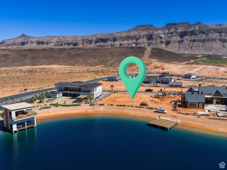 Build your DREAM lake house in the premier gated community of Southern Shores!! Access to THREE lakes; Your own private boat dock on Boat Lake, Wake surfing on Surf Lake and honing your wake board trick skills on Cable Lake. And when you're not on the water, pickleball courts and tennis courts  are just steps away!  It's the ultimate luxury neighborhood. This lot offers breathtaking views of pine mountain.  Copper Rock and Sand Hollow Resorts are just 5 minutes away. Boat doc is partially built ($175,000 invested). Build your perfect family get away or a luxury primary residence in Southern Utah's first water sports community!!  Call Agent for details and access.  All information deemed accurate and reliable.  Buyer to verify all.