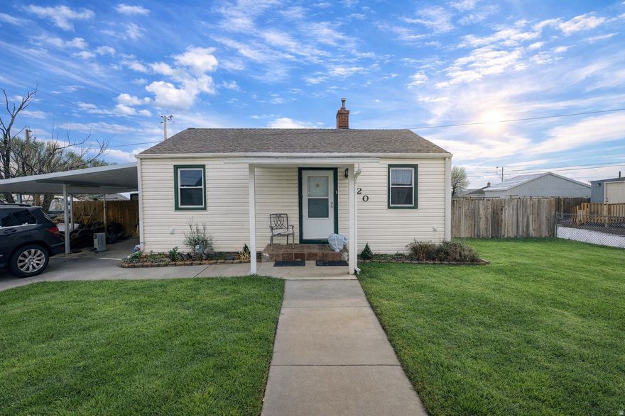 Welcome home to this cozy, completely remodeled 2-bedroom retreat in East Carbon. This home is being sold fully furnished.  Thoughtfully updated from top to bottom, this home offers a warm and welcoming feel with a gorgeous new kitchen and a beautifully remodeled bathroom. The kitchen shines with new cabinets, new countertops, and a charming backsplash that makes the space both functional and inviting.  You'll love the way the classic hardwood floors blend with the beautiful new flooring, adding character and comfort throughout the home. Step outside to a quiet, cozy backyard with a patio, perfect for morning coffee, evening relaxation, or casual get-togethers. The fully fenced yard and sprinkler system make outdoor living easy and enjoyable, while the carport adds everyday convenience.  The unfinished basement provides just the right amount of space for storage or a small workshop. Best of all, the home is being sold furnished, allowing you to move right in and enjoy without the added expense of purchasing furniture.  This charming home is a must-see to truly appreciate-schedule your showing today and come experience the comfort for yourself.  ***May be sold with an extra lot. Parcel number  1C-0106-0000 which is .17 acre corner lot. MLS #2129884 ***