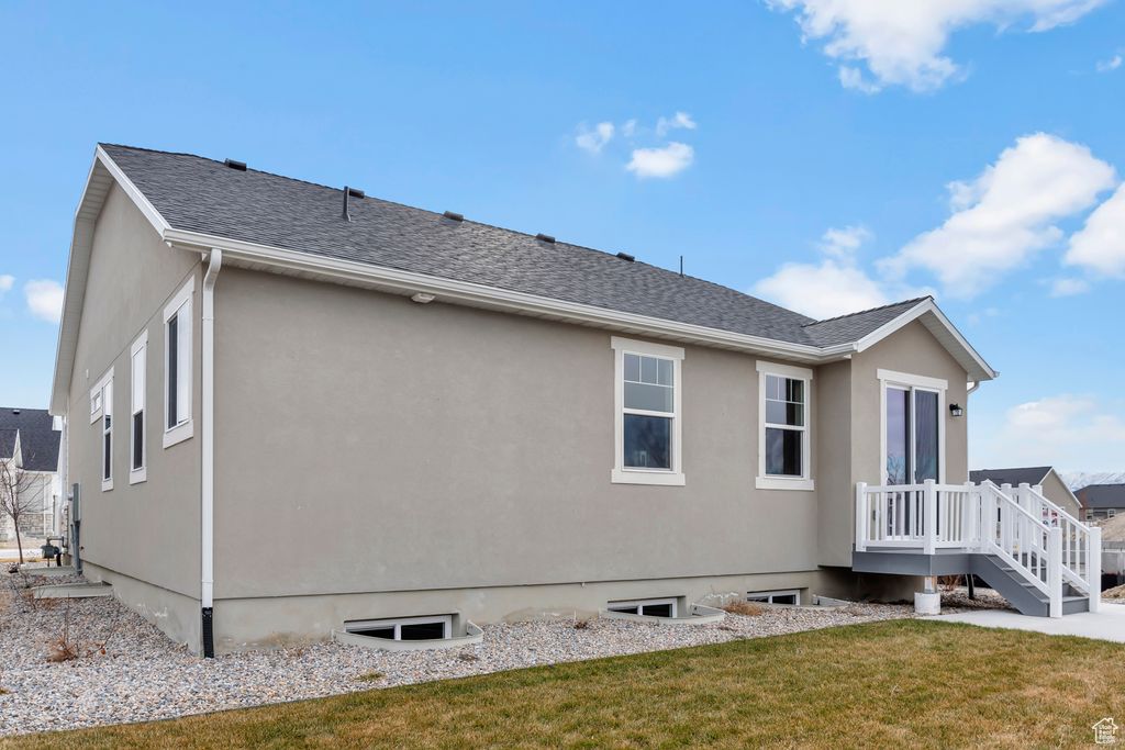 Photo of 674 W JUNEGRASS LN, Stansbury Park, UT 84074 (MLS # 2119752)
