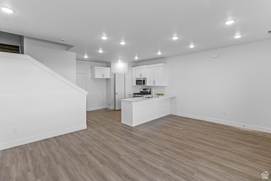 Looking for your first home, a great investment opportunity or anything in between? A townhome in North Point is the perfect choice, with 9 foot ceilings, an open concept kitchen, dining, and living room, and abundant natural light. Also enjoy disc lights in the great room and beautiful chip-resistant quartz countertops throughout the kitchen and bathrooms. In North Point, every square foot is designed with your lifestyle and comfort in mind. Don't forget to ask about our preferred lender incentives!  *Square footage figures are provided as a courtesy estimate only. Buyer is advised to obtain an independent measurement.