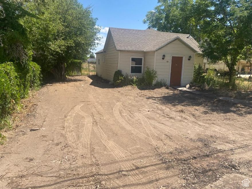 Built in 1896!  So sorry, it will not go VA or FHA.  It sits on 0.46 acre and has city water, city sewer, and power. It is on the border of Vernal City and Uintah County and is in the County. Zoned Residential. Talk to the county if you would like to do something different with the property. It is narrow at the front, wide in the back, and fenced.  Multi-family may be possible.  It is vacant and easy to show! Call us today!  Property to be sold in "as is" condition.
