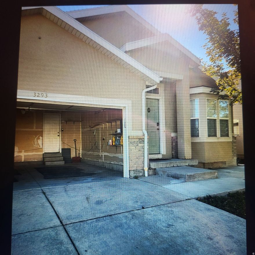 This charming, move-in-ready home features four bedrooms and three bathrooms, a fully fenced yard, and a two-car garage. Conveniently located just minutes from I-215, Bangerter Highway, and a shopping center, as well as Salt Lake International Airport, this property offers both comfort and easy access. The basement has been recently upgraded to include an additional bedroom, a bathroom, and a spacious family room.