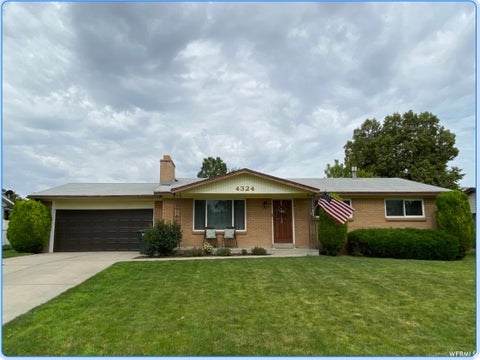 Photo of 4324 S MIGNON DR, West Valley City, UT 84120 (MLS # 2139354)