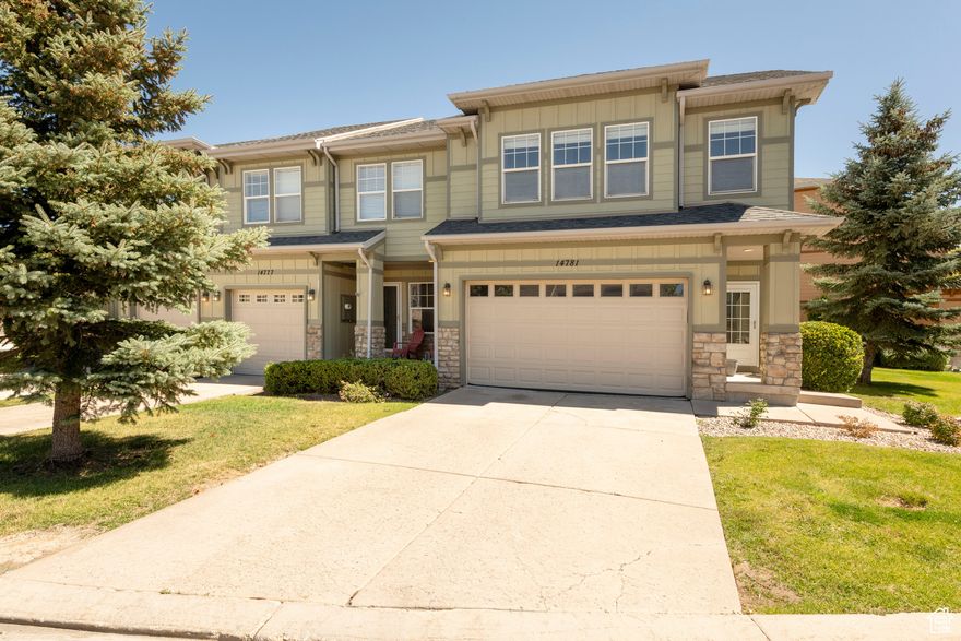 Live elevated in Stoneleigh Heights! Perched atop Salt Lake City's south mountain, this bright end-unit townhome offers views of the valley and Wasatch peaks. Located in a great community and where the HOA ensures snow is always plowed! Step outside to explore scenic trails, or take a short stroll to the SunCrest clubhouse, pool, gym, and other community amenities. Inside, sunlight floods the open living spaces, highlighted by a cozy gas fireplace-perfect for snowy winter evenings. The fully fenced backyard patio is ideal for gatherings or letting pets roam safely. Upstairs the spacious primary suite features a walk-in closet. The finished basement includes a wet bar, family room, and extra storage-making this home as functional as it is beautiful. With a 2-car garage, main-floor half bath, and unbeatable access to outdoor adventure, this is mountain living at its finest.