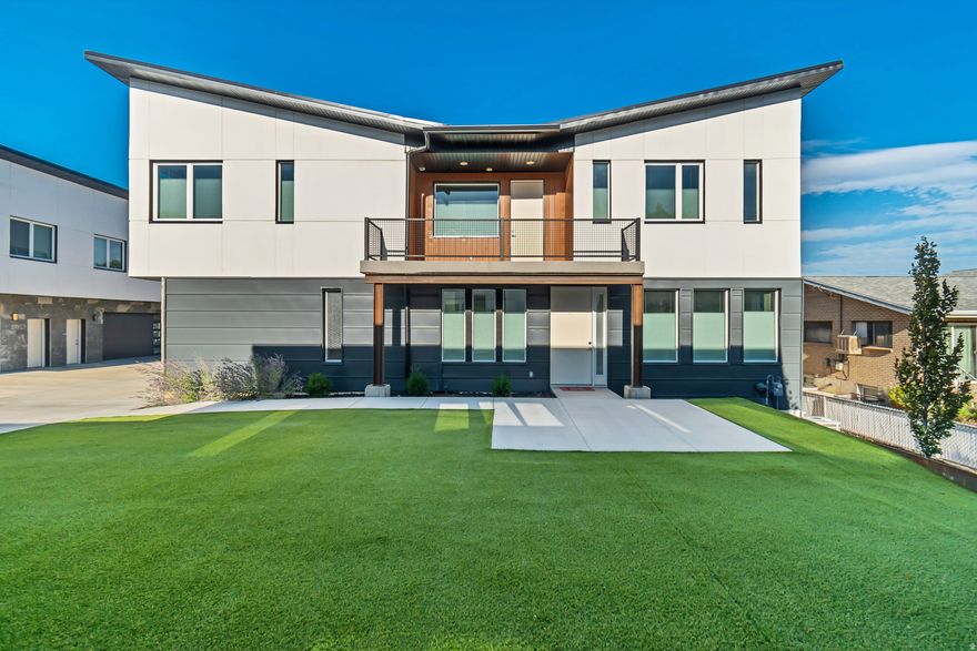 OPEN HOUSE THIS SATURDAY 2/7 FROM 11AM-3PM. GET A 5.625% (5.864% APR) INTEREST RATE 30 YEAR FIXED ON A CONVENTIONAL LOAN THROUGH OUR PREFERRED LENDER. Rate contingent upon credit analysis, lender approval, and market conditions (01/27/2026). This luxury twin home offers a clean, modern design with high quality construction throughout that makes it truly one of a kind. There is nothing else like this in the area! This is a custom built home made entirely out of concrete. The structure presents durability, sound separation, and energy efficiency. The home features high ceilings on the second floor that creates an open, bright, and airy living environment with large windows that flood the spaces with natural light. Thoughtful design and contemporary finishes provide both comfort and functionality, while the efficient layout makes the most of the large space. The basement has 9 foot ceilings and is fully finished with ample natural and recessed lighting, along with a half bathroom for added convenience. Along with the 3 bedrooms upstairs is a large loft that provides additional space for relaxing and entertainment. With a low-maintenance lot and convenient access to shopping, dining, and major commuter routes, this home offers a refined and luxurious living experience in a desirable Midvale location. Also for sale is 7045 S 300 E (MLS #2133205).  THERE IS AN HOA! We are finalizing the details and will put them in once we have them.