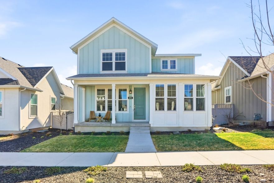 Welcome to this beautifully maintained, modern home in Daybreak's sought-after Cascade Village in South Jordan. Built in 2023 by Holmes Homes, this residence offers a rare combination of thoughtful design, elevated finishes, and exceptional future expansion potential.  With approximately 3,805 total square feet, including a full unfinished basement, the home provides both immediate comfort and long-term versatility. The open-concept main level is anchored by a stunning great room with an 18-foot vaulted ceiling, creating a bright, airy space ideal for both everyday living and entertaining.  The kitchen is a true focal point, featuring a 10-foot quartz island, upgraded GE and LG appliances, and generous cabinetry designed for both function and style. The main-level primary suite offers convenience and privacy, while a dedicated office or den provides the perfect space for work or study.  Upstairs, three spacious secondary bedrooms and a versatile loft offer separation and additional living space, ideal for family, guests, or a secondary lounge.  Thoughtful mechanical upgrades enhance daily comfort, including dual-zone HVAC for independent climate control between the main and upper levels.  The unfinished basement features 9-foot ceilings and is designed to accommodate up to three additional bedrooms and two bathrooms-offering a clear path to increased living space and long-term equity.  Additional highlights include a radon mitigation system, on-demand water heater, water softener, furnace humidifier, full Ring security system, and automated modern blinds throughout (approximately a $10,000 upgrade). The fully fenced backyard is complete and ready for immediate enjoyment.  The extra-tall attached garage with fully epoxied flooring provides excellent storage and a clean, low-maintenance utility space.  Located in the heart of Daybreak, this home is within walking distance to The Watercourse and just minutes from Oquirrh Lake, along with miles of walking and biking trails, pools, fitness centers, parks, and year-round community events, with convenient access to TRAX, shopping, dining, and schools.  This is a rare opportunity to own a newer, upgraded home with significant room to grow in one of South Jordan's most desirable master-planned communities.