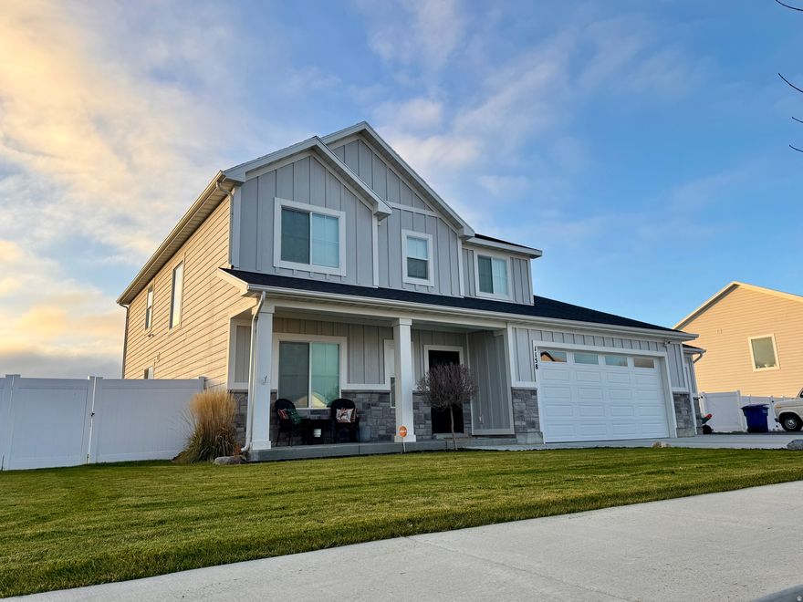This home is what you have been looking for in a prime location in Hyrum.  The views from your backyard of the mountains are unbelievable and worth enjoy the seasons.  Fully fenced in yard that has been beautifully landscaped.  The five bedroom home with a living room, kitchen, 2 full and 1 half bathroom, and two family rooms.  This home is great for a large family or entertaining.  Looking for an extra room or storage?  Extra 200 sq ft room that can be used for either.  Also the garage is 1092 sq ft.  Big enough for 4 cars.
