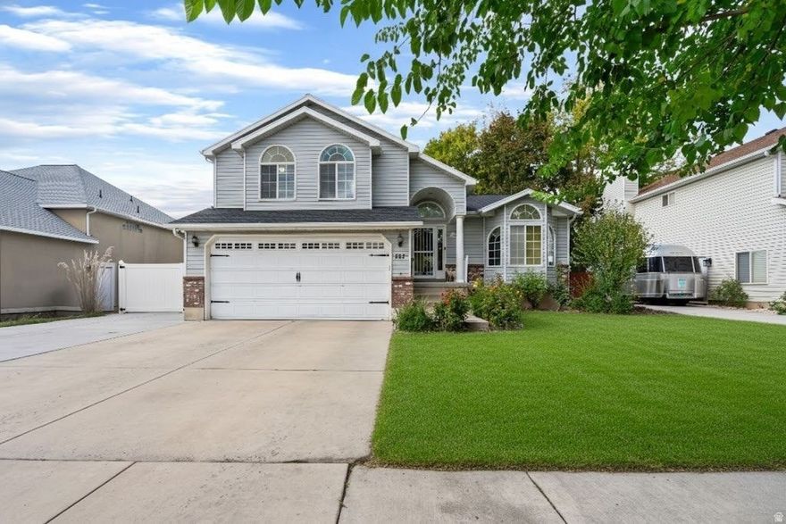 This spacious 4-bed, 4-bath home offers over 2,800 sq ft of bright, inviting living space paired with thoughtful updates throughout. Recent upgrades include a brand-new roof, furnace, and water heater-all replaced within the last two years, giving you peace of mind for years to come.  Step inside to a warm, open layout with vaulted ceilings, classic finishes, and plenty of natural light. The kitchen features generous cabinet space and flows seamlessly into the dining and living areas-perfect for everyday living and entertaining alike. Upstairs, you'll find comfortable bedrooms with vaulted ceilings and walk-in closets, while the lower level provides bonus space for a gym, office, or movie room.  Outside, enjoy a large, fenced yard with mature trees and a dedicated RV parking pad-a rare find in the heart of Murray. The main showstopper is a private in-home sauna room for your own spa-style retreat.  Conveniently located near schools, parks, and shopping with quick freeway access, this home combines comfort, function, and relaxation in one beautiful package.