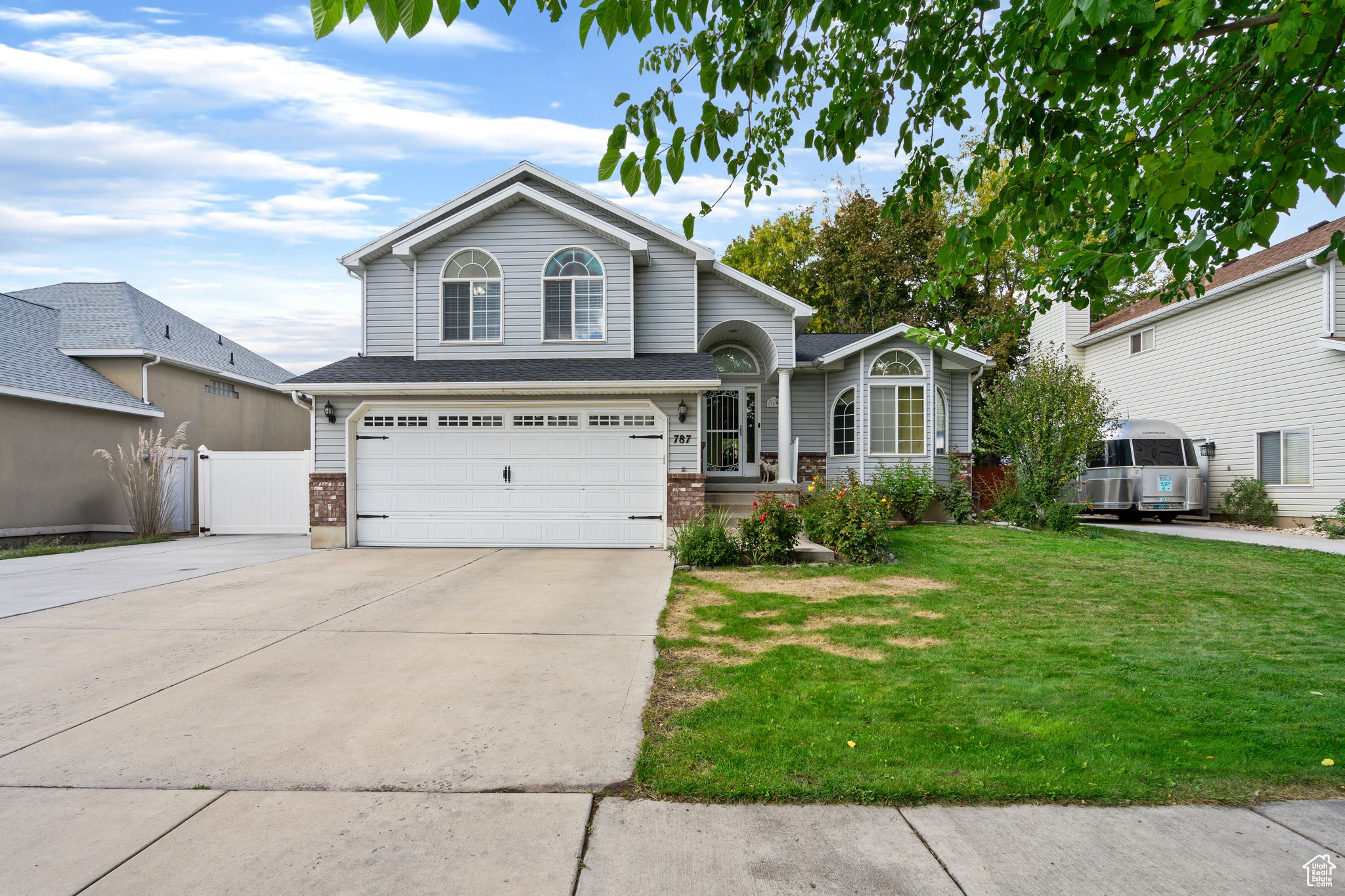 This spacious 4-bed, 4-bath home offers over 2,800 sq ft of bright, inviting living space paired with thoughtful updates throughout. Recent upgrades include a brand-new roof, furnace, and water heater-all replaced within the last two years, giving you peace of mind for years to come. Step inside to a warm, open layout with vaulted ceilings, classic finishes, and plenty of natural light. The kitchen features generous cabinet space and flows seamlessly into the dining and living areas-perfect for everyday living and entertaining alike. Upstairs, you'll find comfortable bedrooms with vaulted ceilings and walk-in closets, while the lower level provides bonus space for a gym, office, or movie room. Outside, enjoy a large, fenced yard with mature trees and a dedicated RV parking pad-a rare find in the heart of Murray. The main showstopper is a private in-home sauna room for your own spa-style retreat. Conveniently located near schools, parks, and shopping with quick freeway access, this home combines comfort, function, and relaxation in one beautiful package.