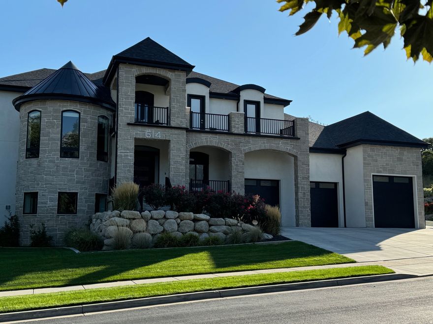 Beautiful custom home located in Healey Heights, a quiet secluded neighborhood with spectacular views of Lone Peak and Timpanogos, this house has it all! It has a theater, weight room, cardio room, indoor soccer field, indoor basketball court, 2 offices/dens, a beautiful spiral staircase and a large living room with a stone and hearth gas fireplace and a 16' double sliding glass door overlooking the pool. The gourmet kitchen has quartz countertops, an oversized raised island, a 48" Thermador range with a double oven including a steam oven and warmer, 2 dishwashers, a built-in nugget ice maker, separate 36" paneled fridge and freezer, double pullout garbage/recycle bins and a panel door into the hidden oversized pantry with a grocery door to the garage. The home also features a large primary with a gas fireplace, steam shower, freestanding tub, his/her sinks and toilets and a WIC with laundry. There is a rec room with a wet bar and outdoor balcony. There are built-in speakers throughout the house to listen to your favorite music. The private backyard has amazing mountain views, especially from the heated gunite swimming pool with a diving board and water slide, built in jetted hot tub and an automatic cover. The backyard also features a covered BBQ area, firepit and a pool bathroom. The garage is oversized with room for 5 cars and an outdoor sink. Other features including an upstairs laundry room, a water softener, filtered water and instant hot water dispenser, bedroom wall lighting, oversized farmhouse sink, pot filler, microwave drawer, custom front door, spot-resist hardware and faucets, primary bathroom countertop cabinets with outlets and a pull-out drawer for hairdryer etc. Central Vac and private access to the backyard from the primary. This property has many more design elements and features. A must see!  Located less than 1 mile from beautiful Creekside Park featuring 24 acres, Splash Pad, Tennis courts, basketball courts, sand volleyball, Pavilions and Walking trails. Buyer to verify listing details.