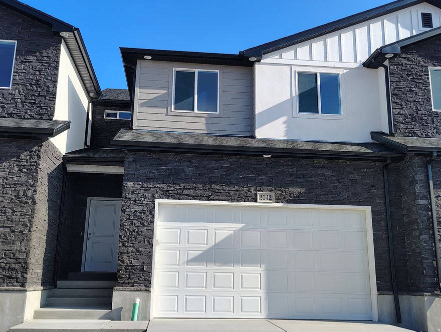 BRAND NEW MOVE IN READY! Fantastic central location walking distance to shopping, medical facilities, schools, and restaurants. Easy highway access & minutes from endless outdoor recreational activities. Kitchen includes granite countertops, knotty alder cabinets, stainless steel appliances & oversized island. LVP flooring on entire main floor. Bedroom-level laundry, grand master bath with separate tub & shower, double sinks in vanity, and large walk-in closet. Vaulted ceiling in master. Each home features a 2-car garage and a fully fenced, landscaped backyard. 30 MINUTES FROM SALT LAKE. $4,500 preferred lender incentive. Square footage figures are provided as a courtesy estimate only and were obtained from builder plan.