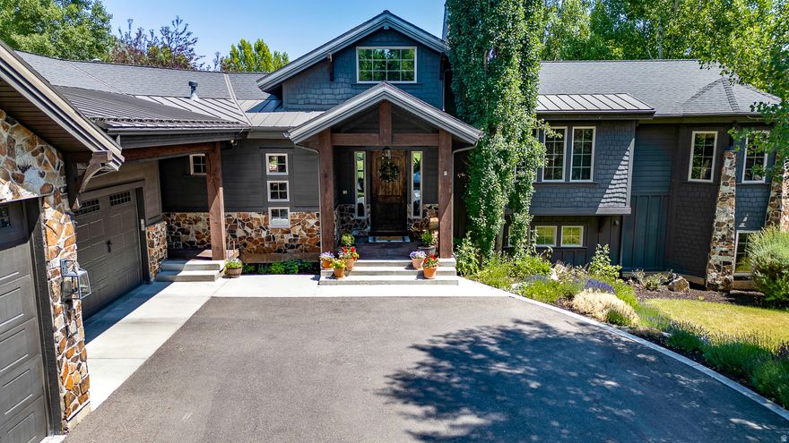 Rare offering in Midway's iconic Dutch Fields neighborhood, this premium .74-acre cul-de-sac property captures refined mountain living. Set along a peaceful stream and open space, the property showcases mountain views and beautiful mature landscaping. The home features an open great room with soaring ceilings, beams, and a striking wood-burning fireplace. The layout includes 4 bedrooms, a main-level primary suite, and a dedicated office. The walkout lower level is designed for entertaining with a spacious family room with a pool table, gas fireplace, home theater, and kitchenette. A rare opportunity for privacy, recreation, and elevated mountain living. Residents enjoy luxury amenities including hiking and biking trails, swimming pools, tennis and basketball courts, and a clubhouse all within one of Midway's most sought-after communities.