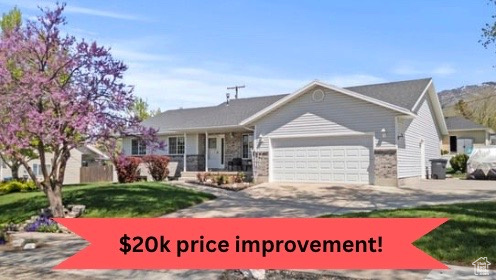 HUGE PRICE IMPROVEMENT!! Sellers will consider all reasonable offers. Motivated sellers ready for a quick close. This beautifully maintained, move-in-ready home offers spacious main-level living with 6 bedrooms, 3 bathrooms, plus space for an office and exercise/flex room. A stunning family room addition provides the perfect spot for gatherings and entertaining. Features include open-concept design, NEW STAINLESS STEEL APPLIANCES, granite counters, under-cabinet lighting, a formal sitting room, ample storage, and a newer roof. Enjoy the meticulously kept yard with outdoor drinking fountain, oversized 2-car garage, RV/trailer parking, and mountain views. Minutes from schools, parks, and recreation-just 10 minutes to Cherry Peak Ski Resort and 20 to Logan. Buyers are encouraged to obtain an independent measurement.