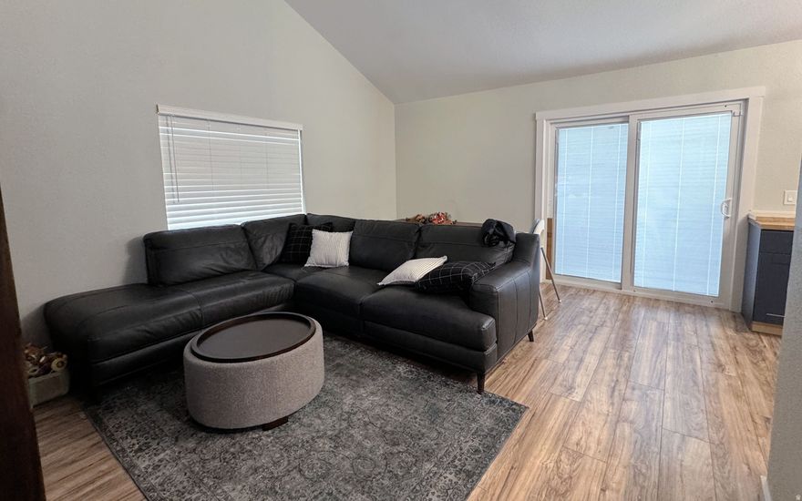 PRICE REDUCED! Discover this beautifully updated, open-concept townhome, perfectly situated near the local golf course, shopping centers, schools, and parks. The property offers convenient access to I-80, making for a quick commute to SLC, and to Davis County. This two-bedroom home includes a spacious two-car garage, ideal for modern living and storage needs. Don't miss out on this fantastic opportunity!  Square footage figures are provided as a courtesy estimate only and were obtained from County Records.  Buyer is advised to obtain an independent measurement.