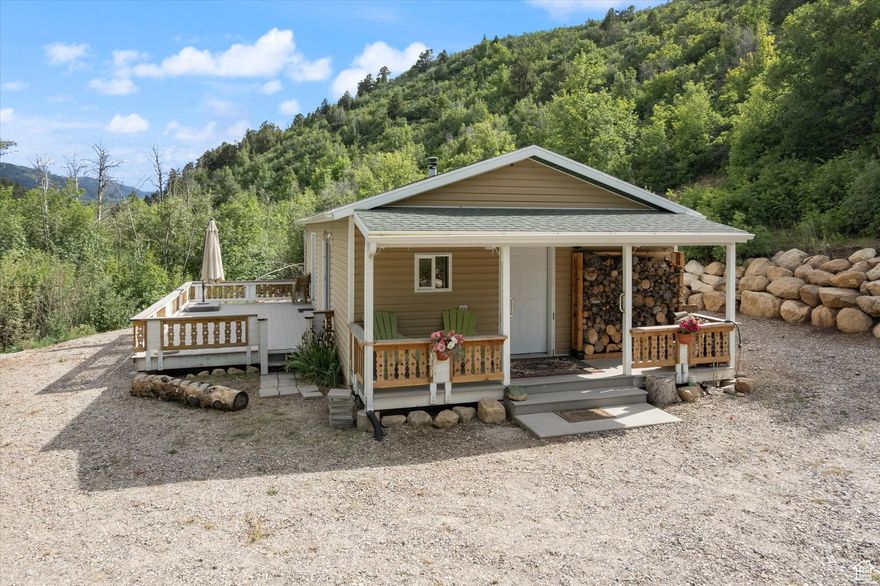 Starry nights. Whispering aspens. A cozy cabin escape. Welcome to your rustic retreat in the gated community of Aspen Hills in Mt Pleasant, Utah - just an hour from Spanish Fork to the north or Richfield to the south. Nestled among mature aspens, scrub oaks, and pine trees with a babbling creek just out your door, this 1-bedroom, 1-bathroom cabin - plus a charming small bunkhouse - is your invitation to unplug, unwind, and reconnect with the simple joys of mountain living. Enjoy meals alfresco on the deck, enjoy the quiet solitude, read under the trees, and spend cool summer evenings swapping stories beneath a sky full of stars. The sounds of crickets, the creek, and a crackling fire set the scene for memories that will last a lifetime. This three-season retreat even adds a touch of adventure with tracked vehicle access in winter. Just down the mountain, Mt Pleasant offers small-town charm and convenience with a grocery store, hardware store, ice cream parlor, local dining, a gift and flower shop, a hospital, aquatics center - and one of Utah's last beloved drive-in movie theaters. NOTE: Electric power is provided by a generator fueled by a propane tank; A delivery service fills the buried 2,000-gallon water tank, which is plumbed into the cabin. Call today to schedule your showing - and discover your new favorite mountain hideaway.