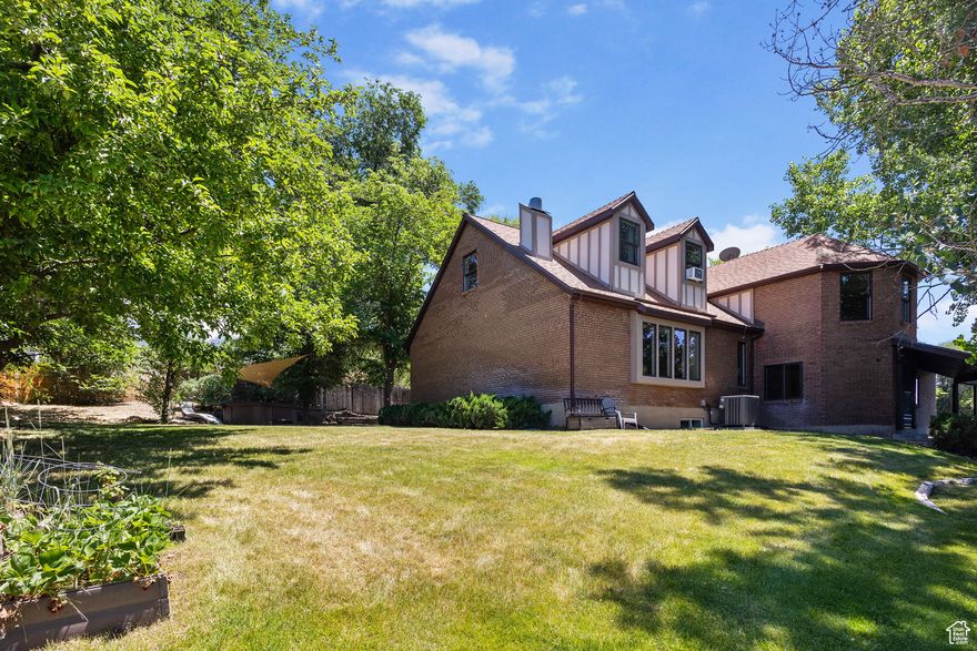 Welcome to your next home in the heart of Cottonwood Heights! Tucked away on a quiet cul-de-sac, this expansive 4,721 sq ft home sits on a private 0.40-acre lot and offers the perfect blend of space, versatility, and comfort. With 6 bedrooms, 3.25 bathrooms, 2 kitchens, and 3 distinct living rooms, the layout is ideal for multi-generational living, entertaining, or simply spreading out in style. Step inside the grand entry foyer, where the scale and flow of the home will immediately impress. The main level features a spacious living room with city views with a cozy fireplace, a formal dining room. Enjoy a well appointed kitchen with semi-formal dining space and a breakfast bar, perfect for everyday meals or special gatherings. You'll also find a 3/4 bathroom, a laundry room, and an additional family room with fireplace. Upstairs, has 4 generously sized bedrooms and 2.5 bathrooms, offering ample space for family/guests. The fully finished basement includes a second kitchen, living room, and two additional bedrooms. Plus a private side entrance, creating a perfect setup for a future Internal Accessory Dwelling Unit (ADU) with rental income, or comfortable mother-in-law family/guest quarters. Enjoy peace of mind with major updates already completed: New air conditioner and water heater, both replaced in 2024. All appliances included, Main Living Room TV included, Hot Tub included! Located in a prime east bench neighborhood just steps from the Cottonwood Heights Recreation Center, and minutes from Willow Creek Country Club and the world-class outdoor recreation of Big and Little Cottonwood Canyons. Rarely does a home of this size and potential come available in such a sought-after location, don't miss your chance! Square footage figures were obtained from county records. Buyer and Buyers Agent to verify all.