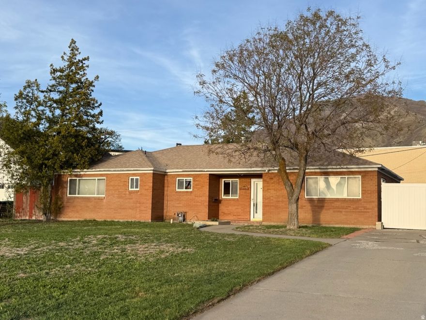 MUST SEE.  Millcreek Rambler with Open Kitchen and Great Layout.  Spacious Primary Suite with Stylish Open Bath and Oversized Shower. Big Family room leading to a Spacious Backyard. Large Family Room. Oversized 2-car garage, and Parking Area. Newer Furnace & AC.  Scenic Mountain and Valley Views.  Great Detached Garage/Shop for the Enthusist. Great Neighborhood of Large Homes. Great Potential with a few updates.  Seller also owns the home to the south, that is why the backyards are open without a boundary fence.   Easy 1 Step Access. Easy to show!