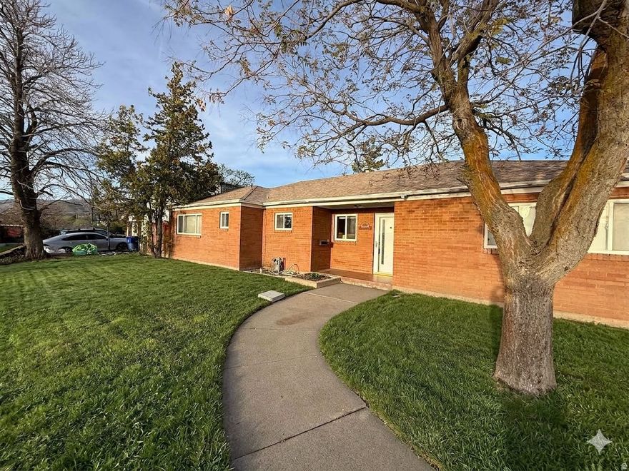 Well located Millcreek Rambler with Open Kitchen and Great Layout.  Spacious Primary Suite with Stylish Bath and Oversized Shower. Big Family room leading to a Spacious Backyard. Oversized 2-car garage, and Parking Area.  Newer Furnace & AC.  Scenic Mountain and Valley Views.  Easy 1 Step Access. Easy to show!