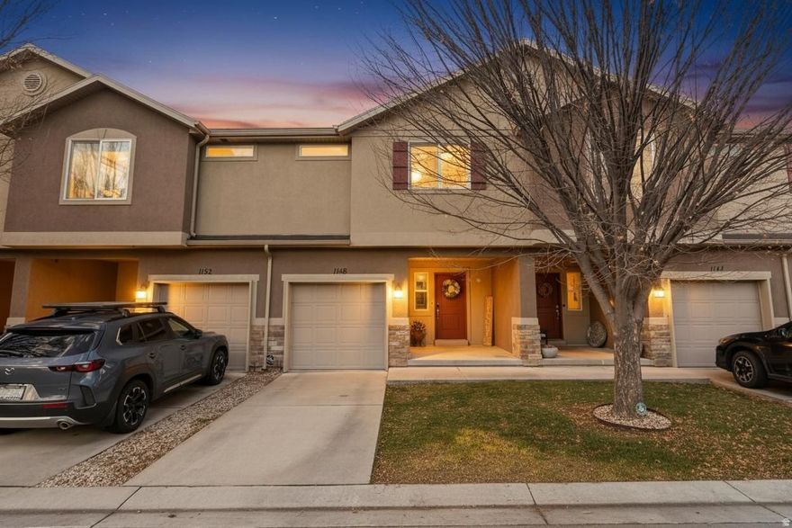 This is THE ONE you've been waiting for!  Centrally located in Layton,  you are minutes away from Dining, Shopping, Entertainment, Public Works, and 1-15 Freeway Access! This well-cared for townhome offers beautiful finishes, ample storage, and thoughtful spaces! Interior paint is neutral throughout, offering a clean and versatile backdrop for any dcor. Planation shutters installed at every window adding class and style and ultimate privacy as well. The kitchen offers generous countertops, a large eat-in bar, stainless steel appliances,  and staggered maple cabinets that any home chef would be proud to create meals in. Are you hosting this year?  Checkout the dining area that fits your full dining table so everyone can enjoy meals together!   From the dining area, your large, light-loving sliding glass door accesses your backyard. The backyard is fully xeriscape, providing an attractive, low maintenance outdoor space ideal for easy living.  Continuing from the dining area, you have a Living Room to enjoy movie nights or the Big Game! Onto the 2nd Level, you'll see the Generously-sized Primary Bedroom and en-Suite Bathroom with large walk-in closet! Enjoy taller vanity with Quartz countertop and large tub/shower with decorative tile surround. Down the hallway is our large laundry room, keeping all your laundry supplies organized with a built in shelf with plenty of room to tackle this week's wash! Across the hall is the large second full bath offering taller vanity with Quartz Countertop, maple cabinets and large tub/shower. At the end of the hall, you'll love two more large bedrooms!  Each bedroom enjoys large windows to let in the sunshine, large walk-in closets,  And plenty of space for your future needs! Enjoy a fully finished garage with new garage opener motor and trimmings (2025).  Store your seasonal items in the garage racks installed! Got more stuff?  Take advantage of the 43" tall crawl space! For your comfort, the HVAC system has been regularly maintained and a new water heater was installed September 2024. The only question remains, So...When would you like to move in?? Square footage figures are provided as a courtesy estimate only and were obtained from a previous appraisal. Buyer and Buyer's Agent is advised to obtain an independent measurement.