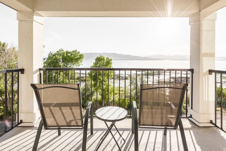 Lake-facing top floor condo in the Vineyard Lakefront community. Incredible lake view and vaulted ceilings. Edge homes added a $50k premium for condos with a lake-facing view at the time of original purchase.  The lakeside walking trail runs right past the condo. The community includes a pool, clubhouse and pickleball courts. Within walking distance of Sunset Beach park, and close to the new Utah City development.     Square footage figures are provided as a courtesy estimate only. Buyer is advised to obtain an independent measurement.