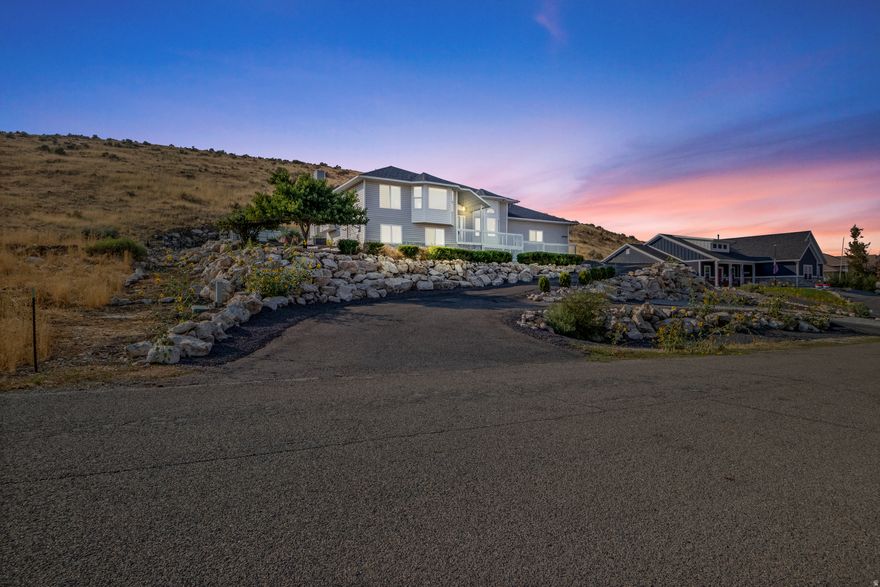 Beautiful 5-bedroom home in sought-after Marble Hills Subdivision.  Enjoy peaceful country living with breathtaking mountain and valley views. This well-maintained home features 5 bedrooms and 3 full bathrooms, vaulted ceilings and a recently refinished family room. The large kitchen and oversized utility room offer exceptional functionality and space. The generous primary suite includes a walk-in closet and a luxurious ensuite bath with a separate shower and large soaking tub. Other highlights include: Newer furnace and A/C, updated bathrooms, newer back deck, freshly landscaped yard, vaulted ceilings and open floor plan ideal for comfortable living and entertaining. This home offers a perfect blend of indoor space and outdoor beauty. Schedule your showing today!