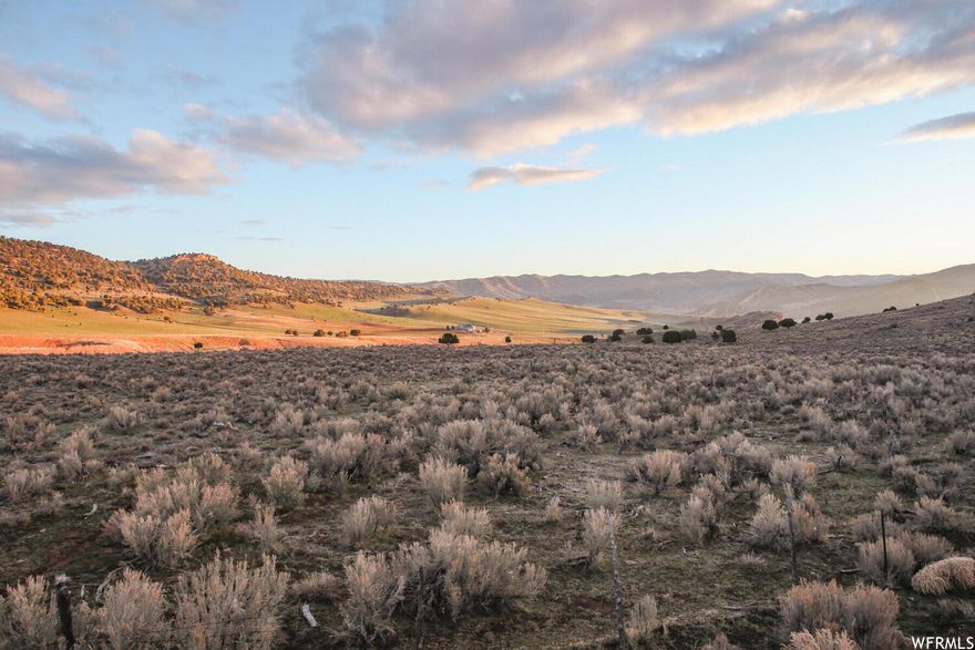 This homesite exemplifies Wohali's open views across the golf course and up to the red rock bluff.  This Estate lot is just far enough back from the 5th hole of the Wohali Championship golf course to enjoy the energy of the golf course but solitude of Wohali.  The location also provides easy access to golf, or a quick walk down to the Burrow for an evening dinner on the patio, as well as easy access to the future Pickle Ball/Tennis Courts at the Wohali racquet center. Lot #7 is a perfect spot to build with a slight downhill sloping lot and expansive views of the Wohali Valley.