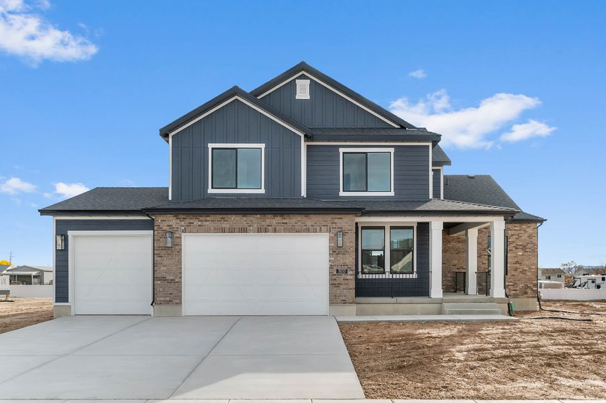 This stunning home showcases timeless design paired with modern upgrades. The kitchen features cotton maple cabinets with LED lighting, elegant quartz countertops, a tile backsplash, and stainless steel gas appliances with double ovens. The expanded 3-car garage with enlarged bay doors provides both convenience and functionality, while the box window in the owner's bedroom adds natural light and charm. The interior includes laminate hardwood, tile, and carpet flooring, large Craftsman base & casing, French doors to the office, and shiplap accents in the living room. The owner's suite is enhanced with a ceiling fan, USB outlets, and tile bathroom surrounds. A gas log fireplace in the great room and an expanded covered deck create warm and inviting spaces for entertaining or relaxing. Upgrades such as 9-foot basement walls, water softener, can lighting, Christmas light outlets, flood light package, gas line to dryer, textured walls, 2-tone paint, and black matte hardware make this home both stylish and practical. This is a must see!