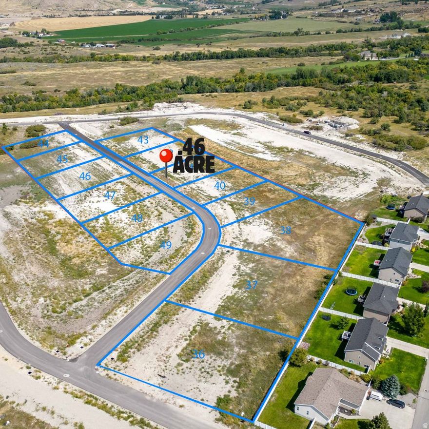 Buildready 0.46acre lot in The Knolls subdivision in Richmond, Utah, with all utilities stubbed and ready for your new home. The generous lot size offers flexibility for a custom floor plan, future shop or RV parking (per city and CC&R guidelines), and a spacious outdoor living area with beautiful Cache Valley views. Located in The Knolls in Richmond UT, this property combines a new community setting with convenient access to Logan, Smithfield, and Utah State University.