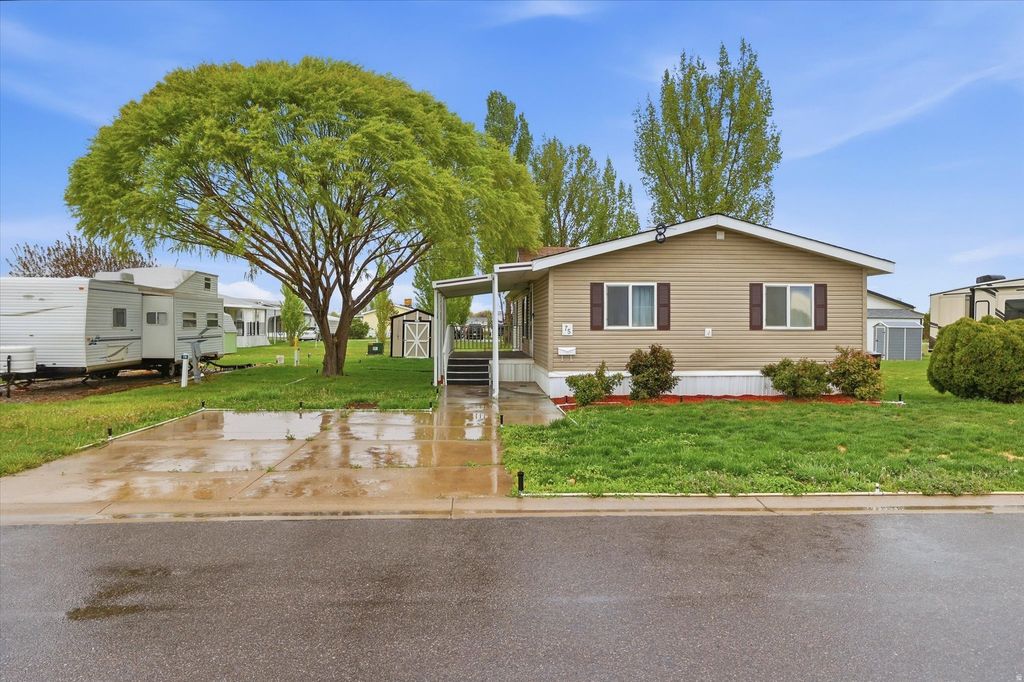 Photo of 900 W MAIN ST #75, Tremonton, UT 84337 (MLS # 2153010)